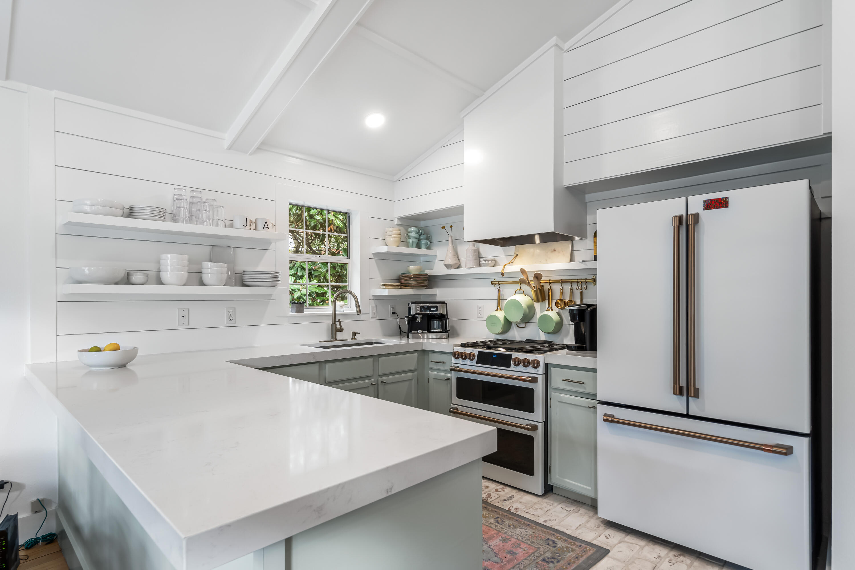 345 Defuniak Street Santa Rosa Beach, FL 32459 - Photo 11 of 52 a white refrigerator freezer sitting in a kitchen