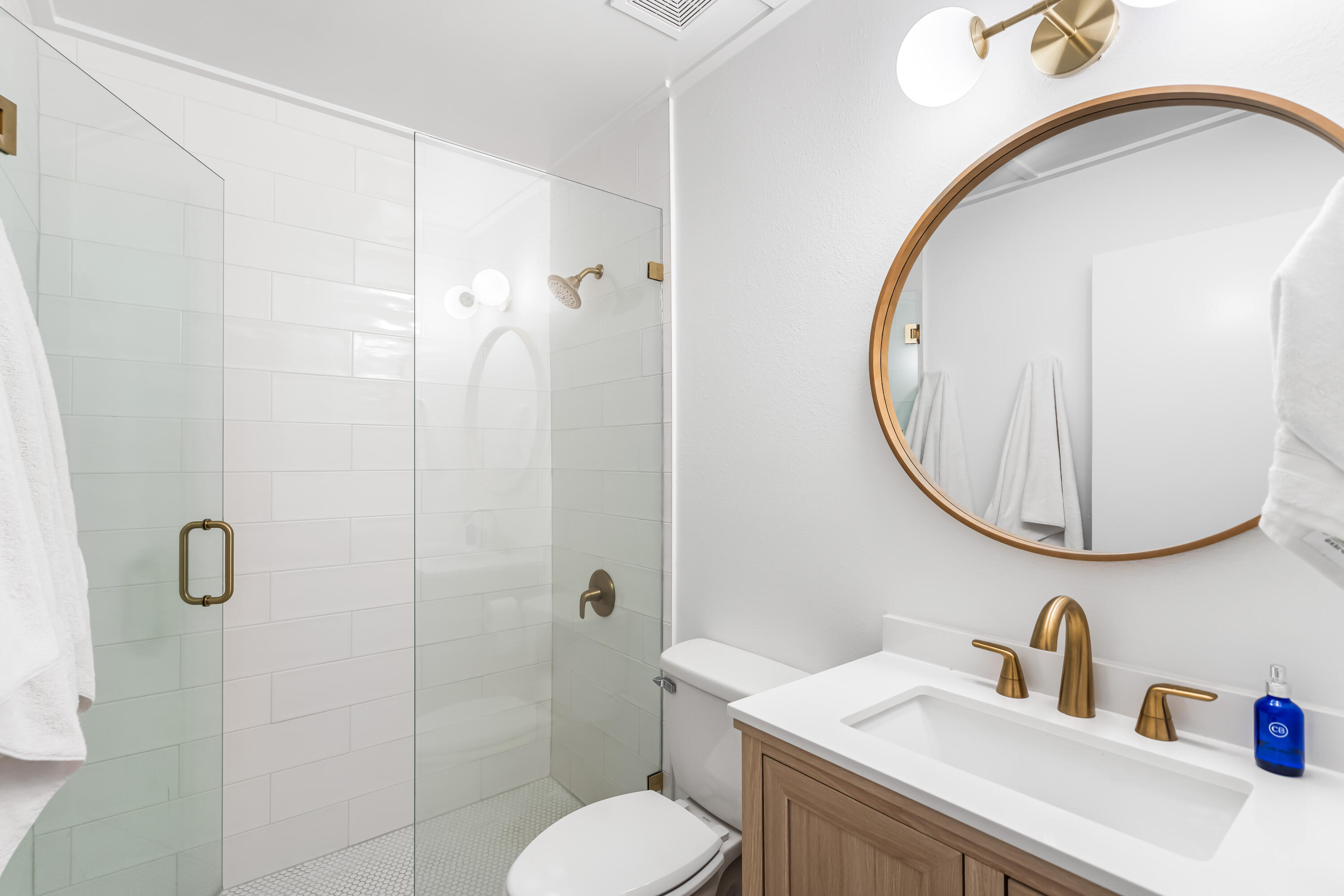 345 Defuniak Street Santa Rosa Beach, FL 32459 - Photo 21 of 52 a bathroom with a sink toilet and shower