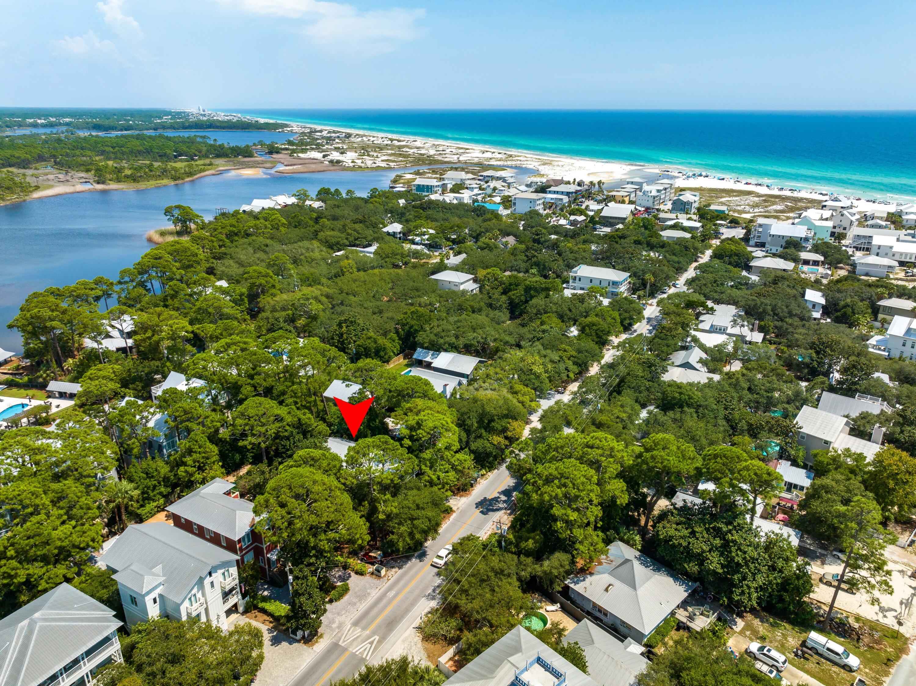 345 Defuniak Street Santa Rosa Beach, FL 32459 - Photo 3 of 52 an aerial view of residential houses with outdoor space and lake view