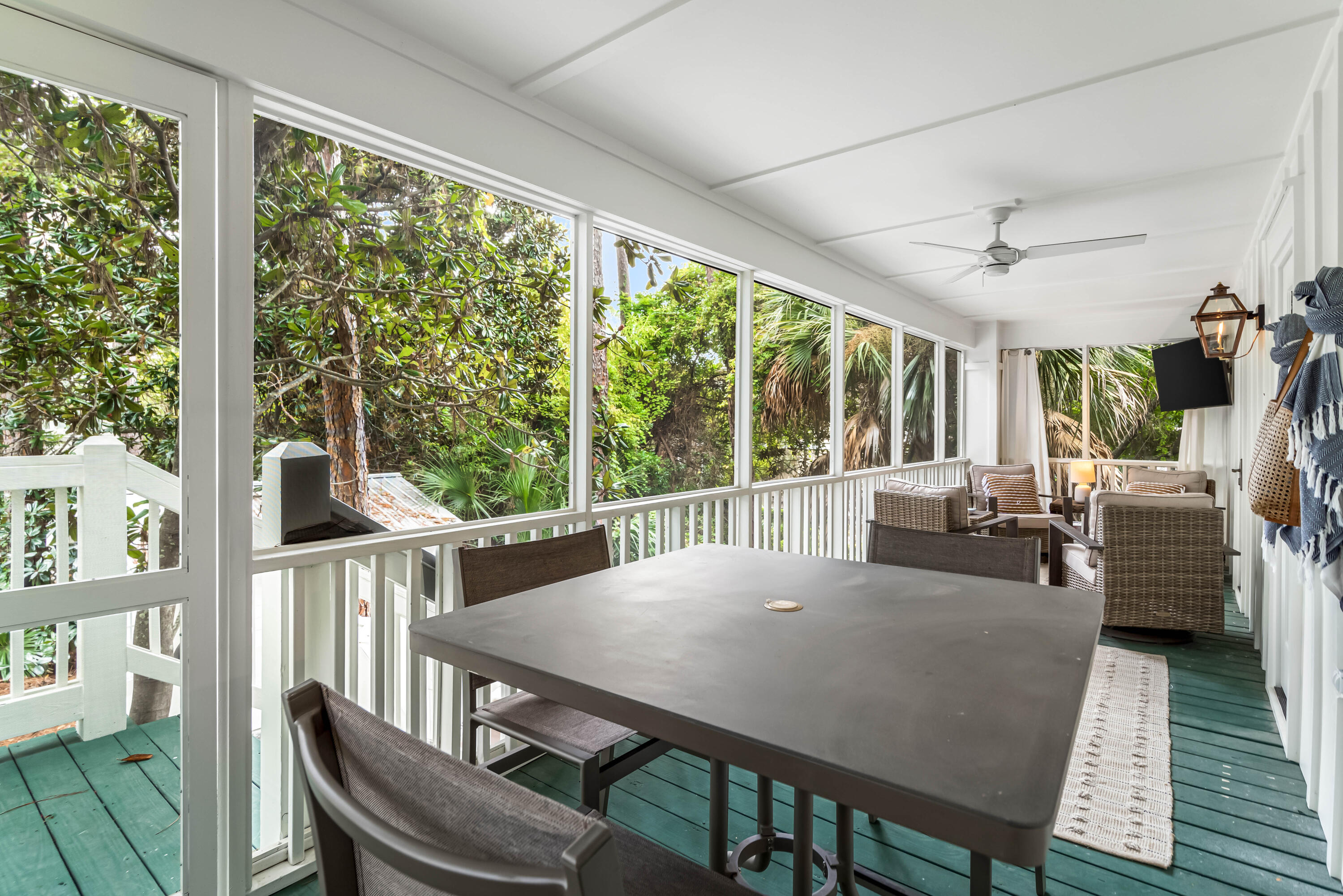 345 Defuniak Street Santa Rosa Beach, FL 32459 - Photo 31 of 52 a view of a dining room with furniture window and wooden floor