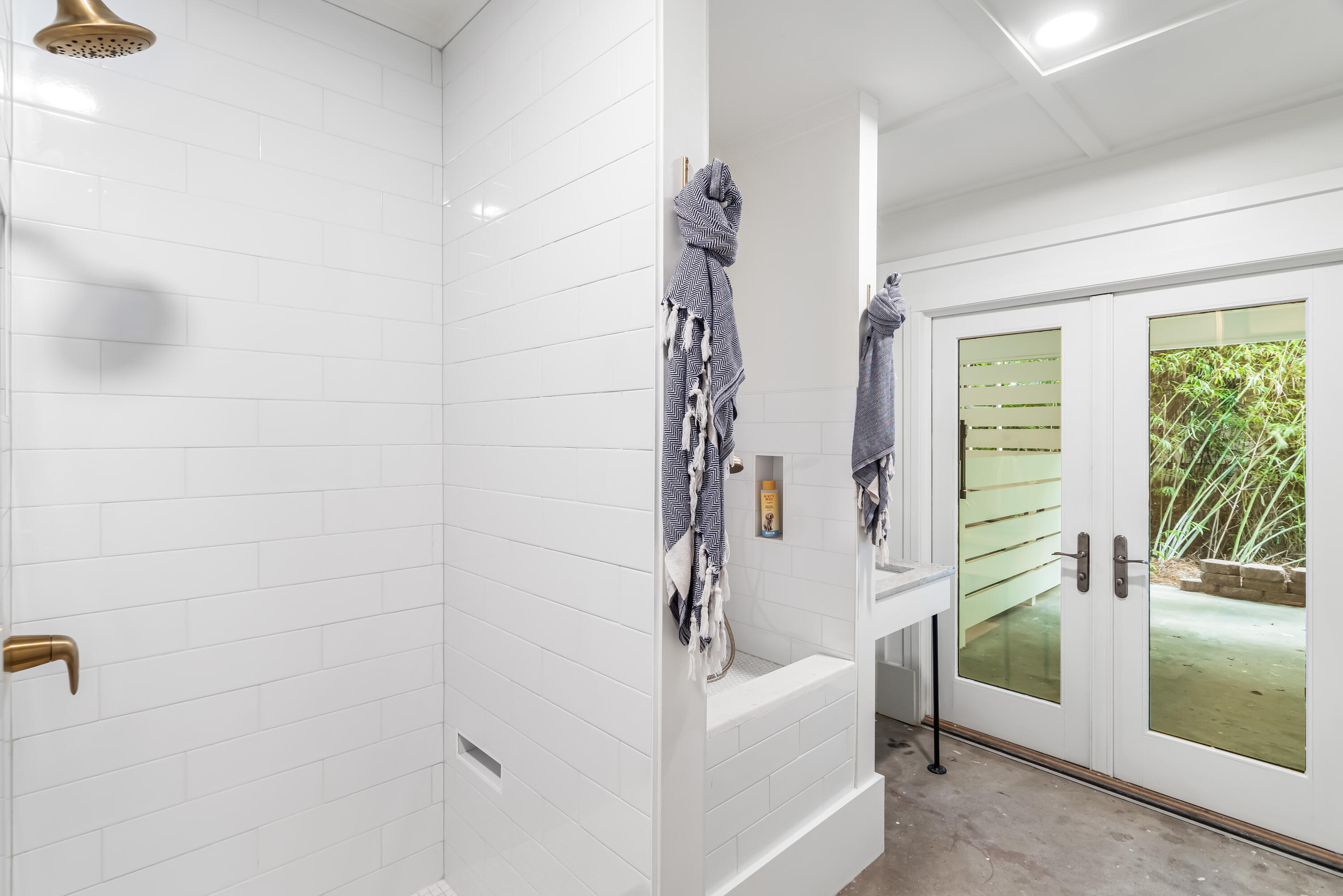345 Defuniak Street Santa Rosa Beach, FL 32459 - Photo 36 of 52 a bathroom with a tub shower and sink