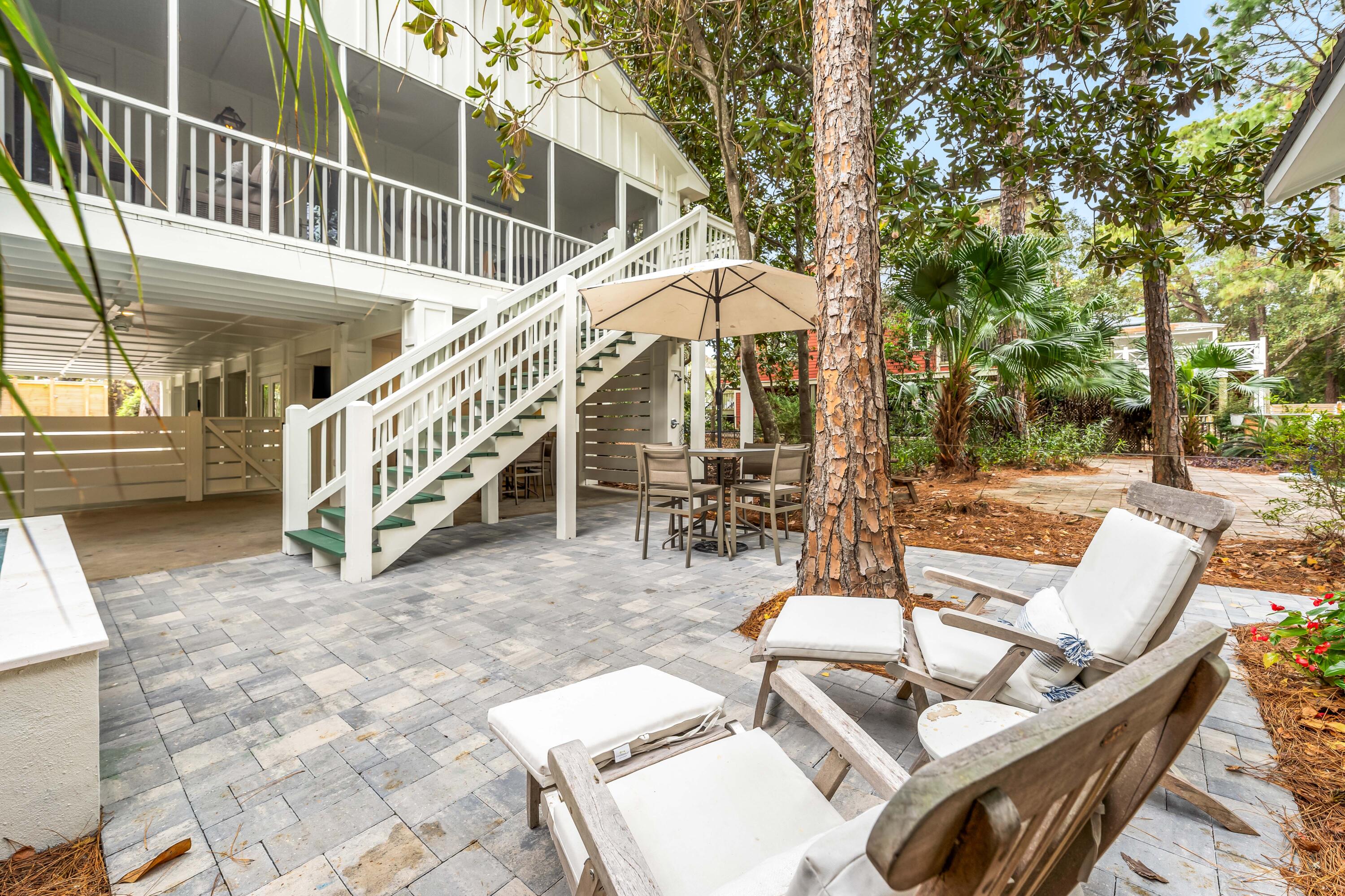 345 Defuniak Street Santa Rosa Beach, FL 32459 - Photo 49 of 52 a view of a swimming pool with seating space