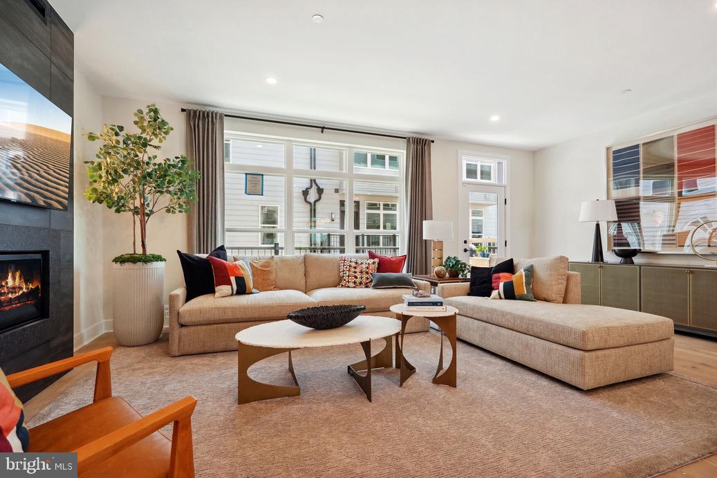 2015 Tysons Ridgeline Road Falls Church, VA 22043 - Photo 7 of 18 a living room with furniture and a large window
