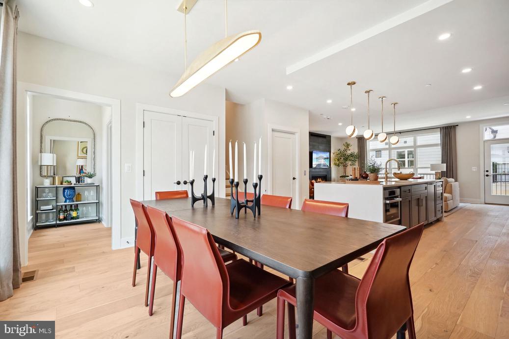 2015 Tysons Ridgeline Road Falls Church, VA 22043 - Photo 8 of 18 a view of a dining area with furniture and a chandelier