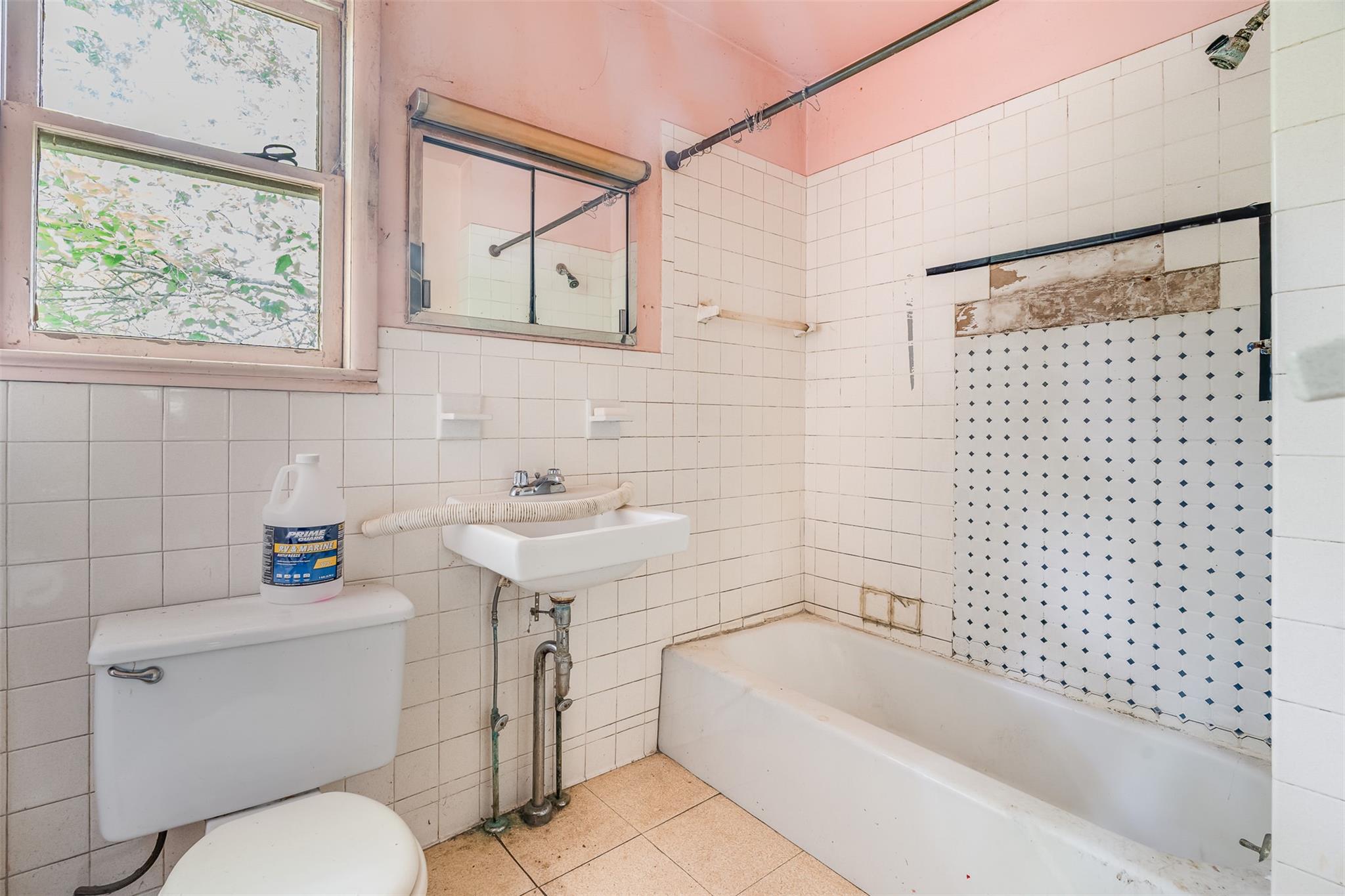 50 Maple Street Catskill, NY 12414 - Photo 13 of 27 a bathroom with a sink toilet and shower