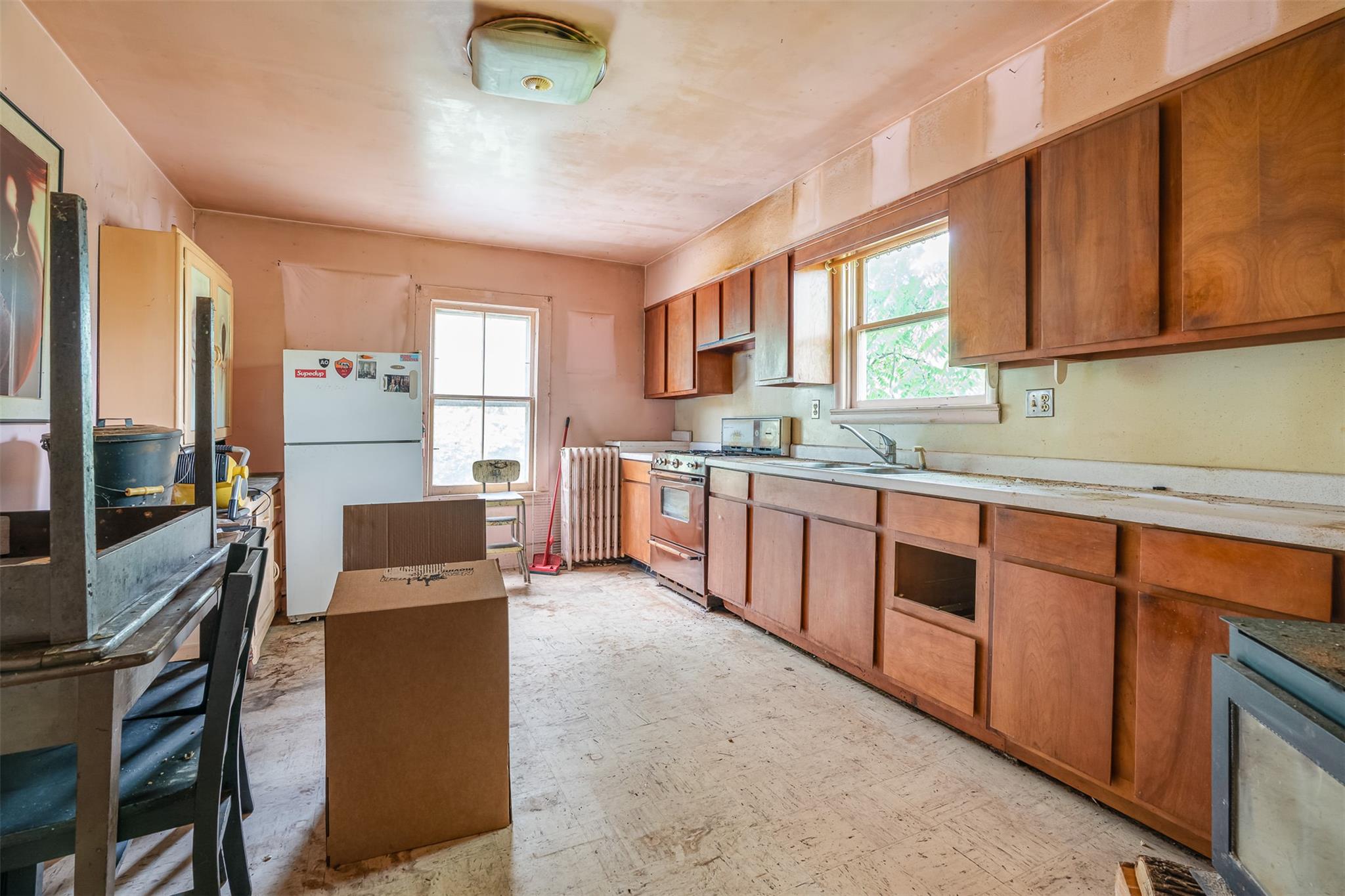 50 Maple Street Catskill, NY 12414 - Photo 16 of 27 a kitchen with stainless steel appliances granite countertop a stove a sink dishwasher and a refrigerator