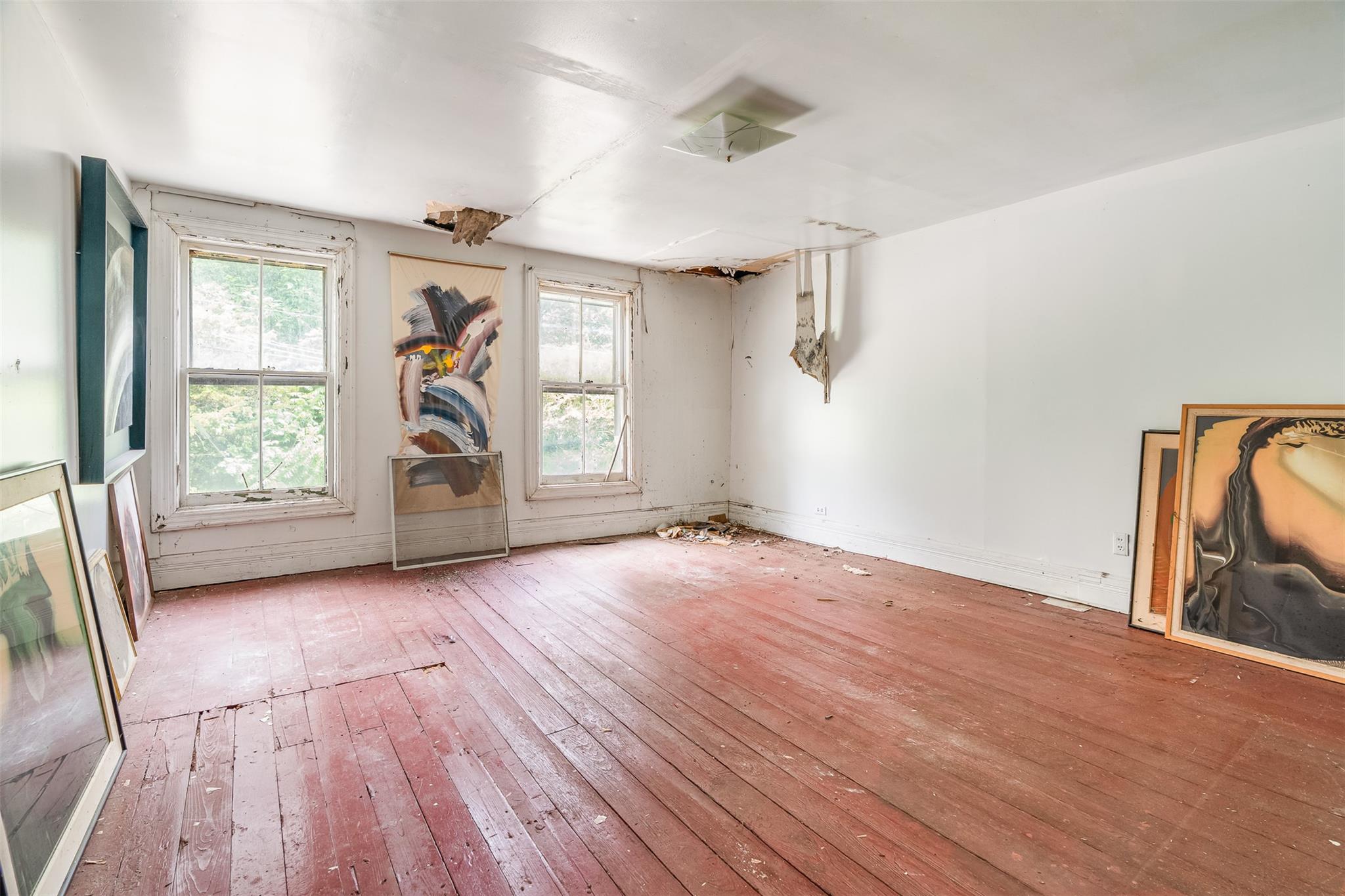 50 Maple Street Catskill, NY 12414 - Photo 18 of 27 an empty room with wooden floor and windows