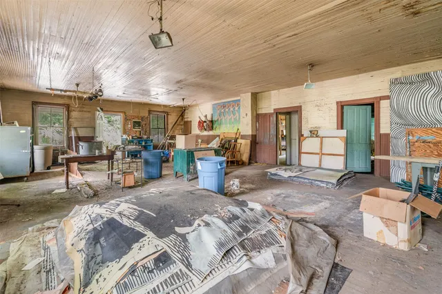 a bed room with a bed and furniture