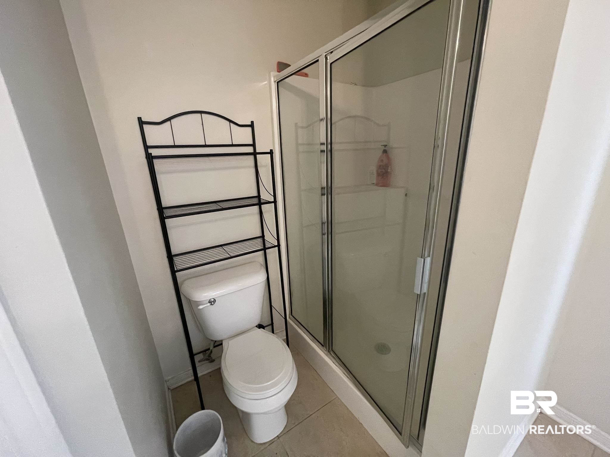 35405 Pine Road South Stapleton, AL 36578 - Photo 16 of 29 Full bath featuring a stall shower and light tile patterned flooring