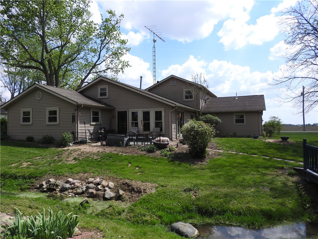 2185 East Loy Road Piqua, OH 45356 - Photo 19 of 19 This charming residence features a spacious yard and inviting patio area, perfect for outdoor enjoyment.