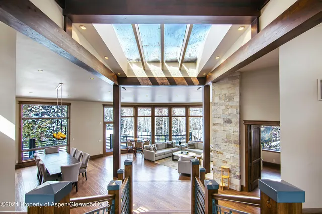 a bathroom with a granite countertop sink mirror and double