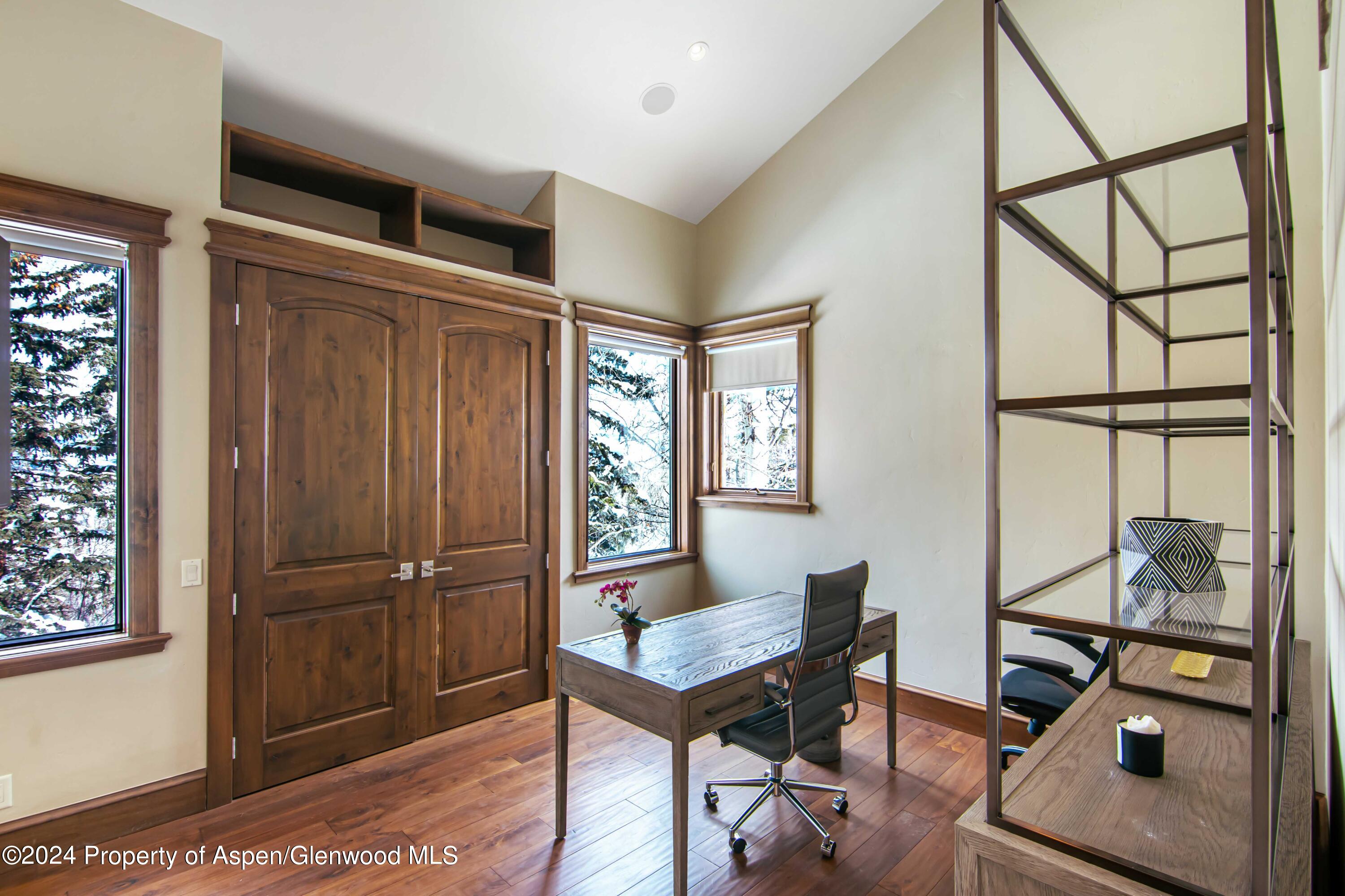 1457 Wood Road Snowmass Village, CO 81615 - Photo 25 of 70 a view of a livingroom with furniture and a window