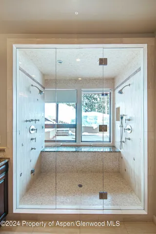 a bed room with a bed and a night stand