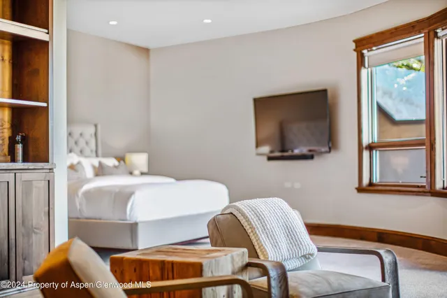 a view of living room with furniture and window