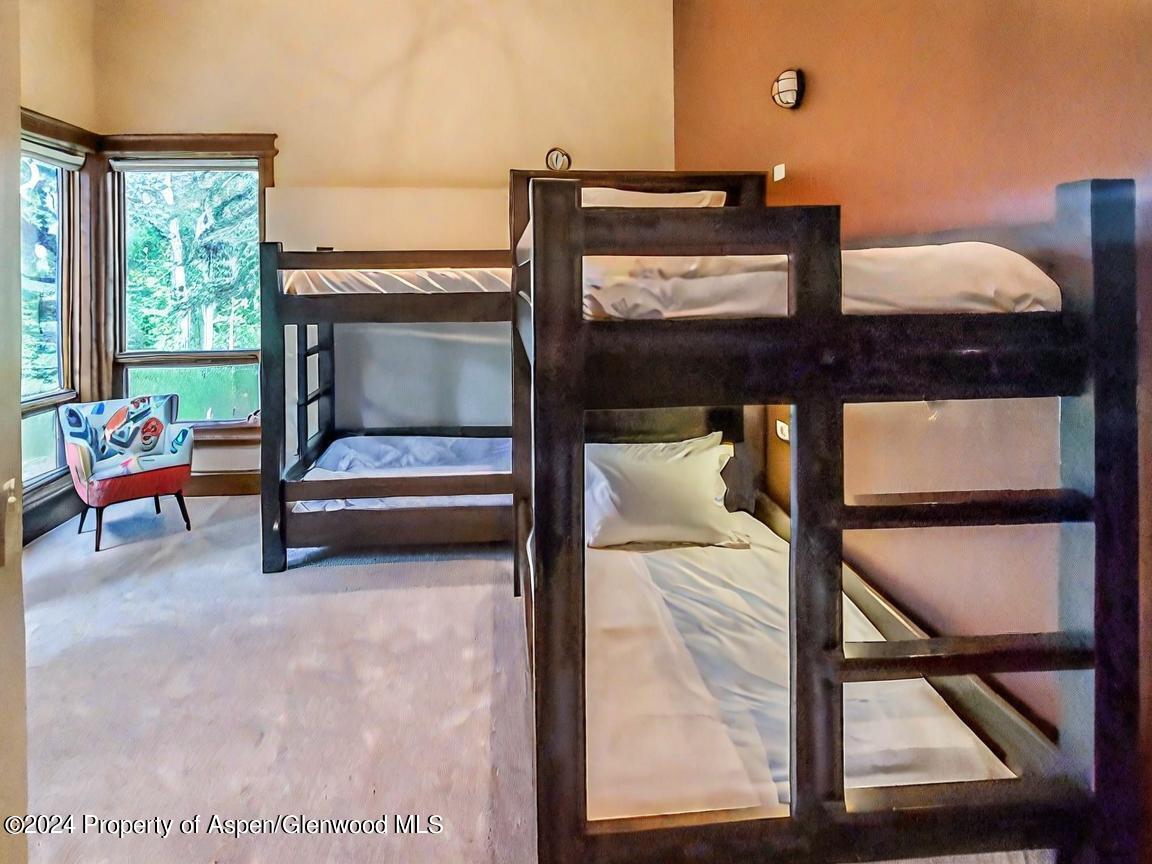 1457 Wood Road Snowmass Village, CO 81615 - Photo 38 of 70 a view of living room with furniture and window