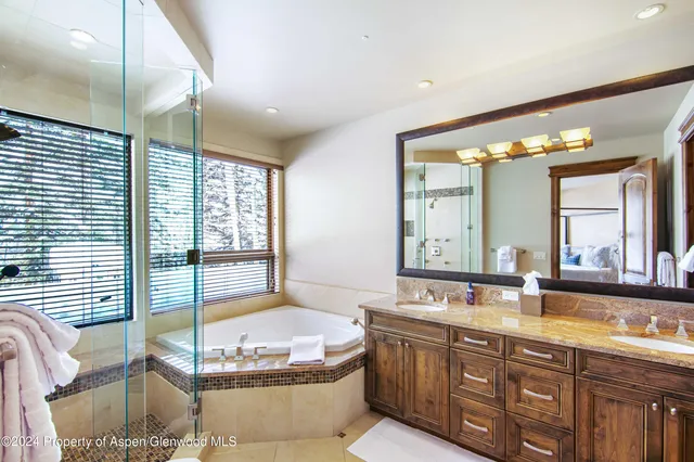a kitchen with a refrigerator and countertop