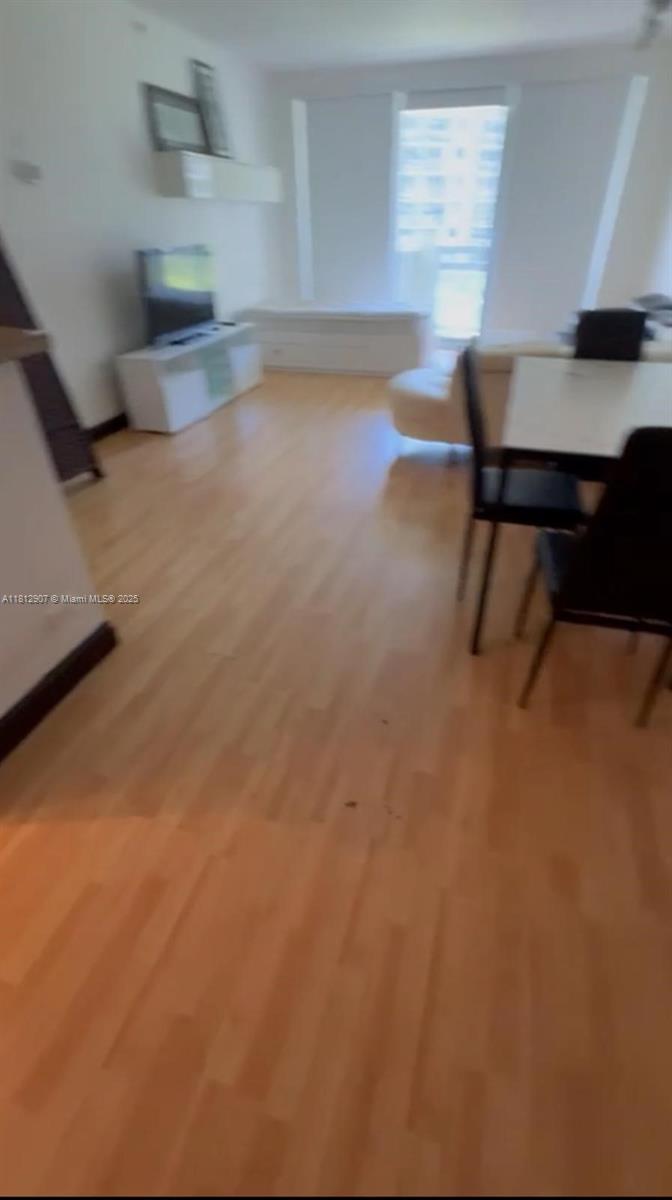 1500 Bay Road, Unit 644S Miami Beach, FL 33139 - Photo 13 of 24 a view of room with furniture and window