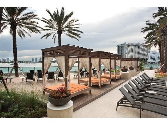 1500 Bay Road, Unit 644S Miami Beach, FL 33139 - Photo 20 of 24 a view of a swimming pool with furniture