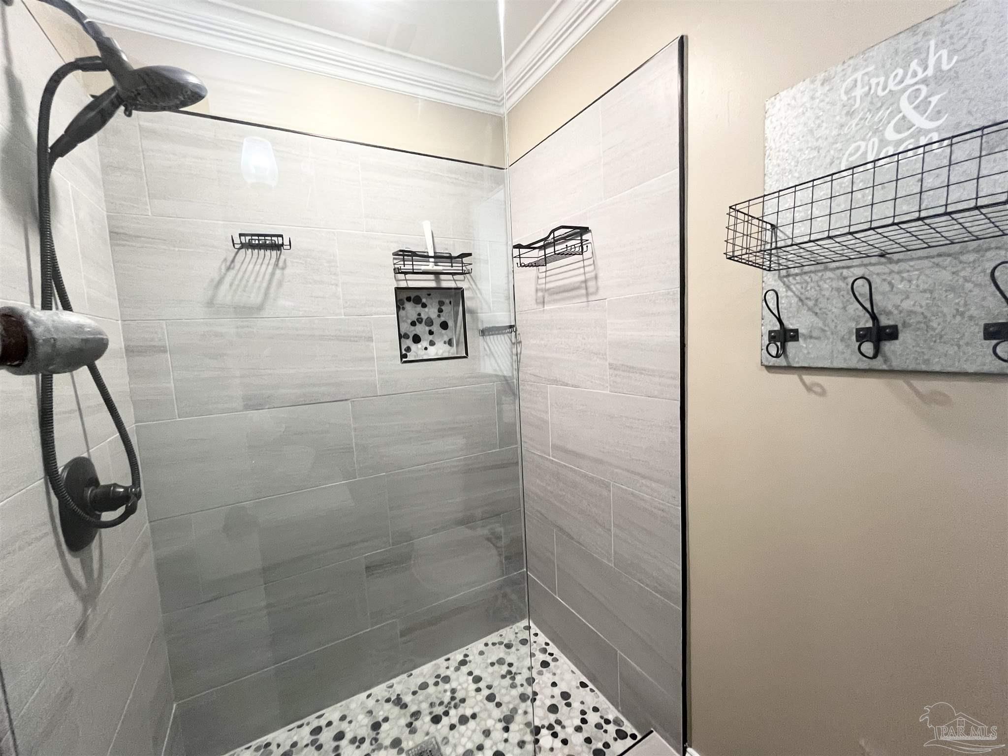 326 East Horner Street Atmore, AL 36502 - Photo 14 of 26 a bathroom with a shower