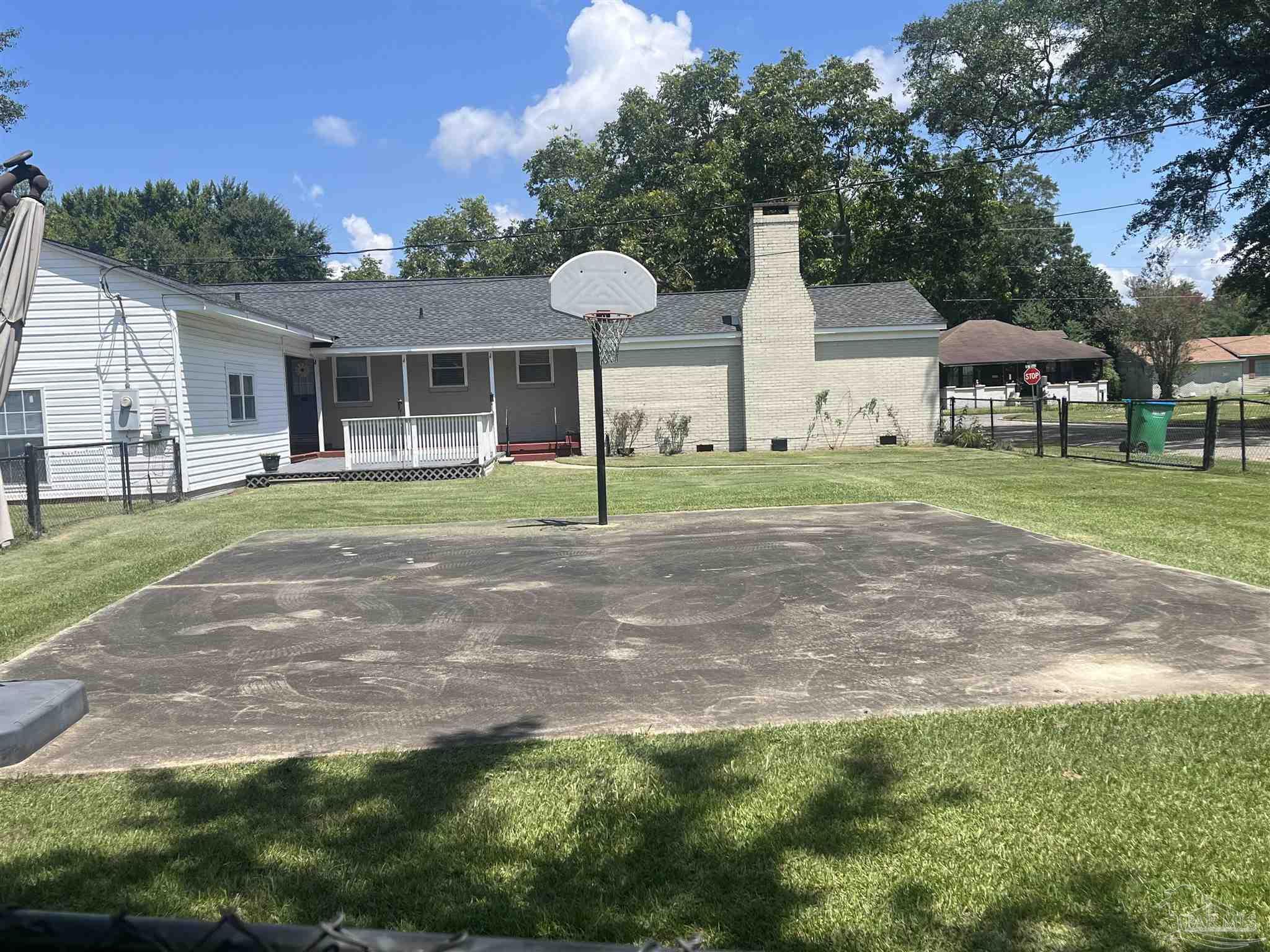 326 East Horner Street Atmore, AL 36502 - Photo 24 of 26 a house view with a garden space