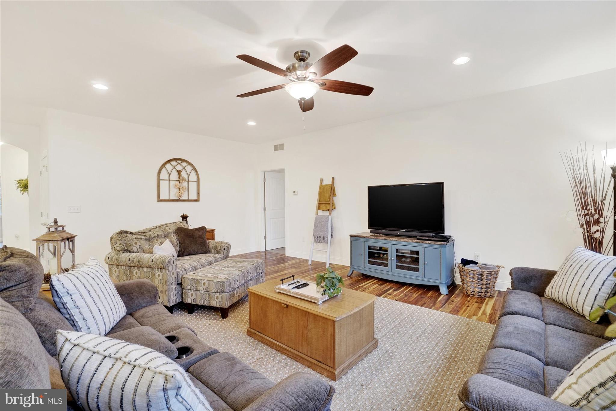558 Rocky Road Red Lion, PA 17356 - Photo 16 of 45 a living room with furniture and a flat screen tv