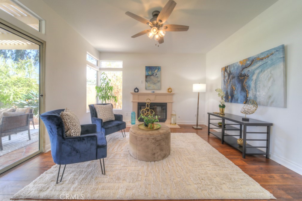 32230 Corte Chatada Temecula, CA 92592 - Photo 15 of 53 a living room with furniture and a fireplace