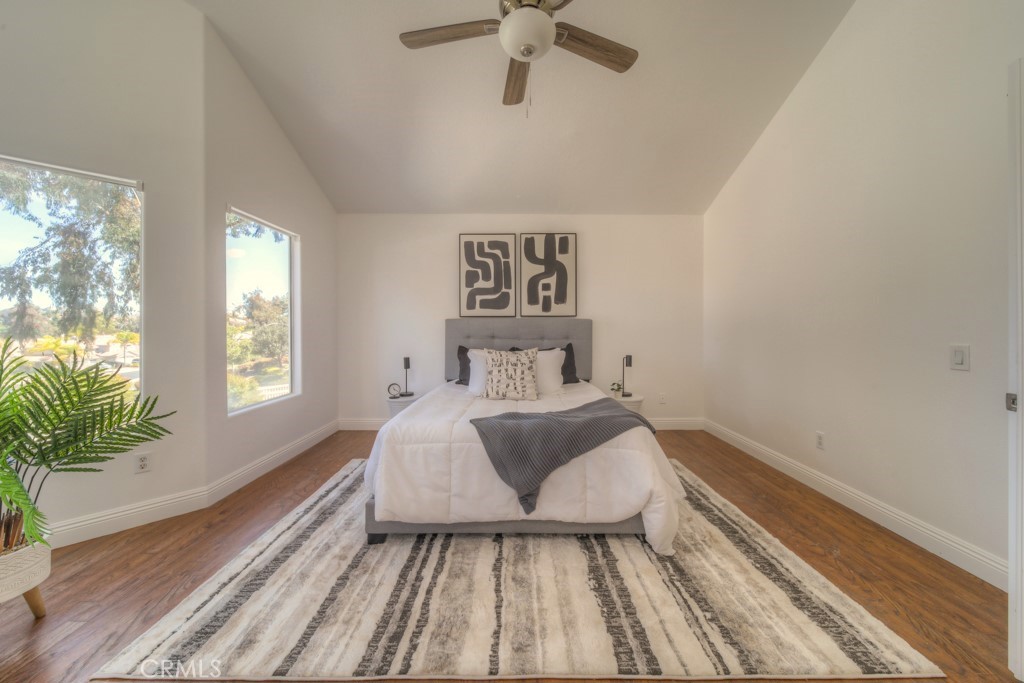 32230 Corte Chatada Temecula, CA 92592 - Photo 33 of 53 a bedroom with a bed and a chandelier