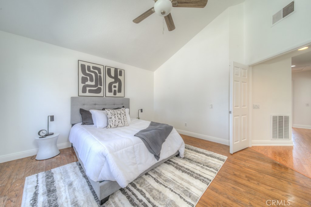 32230 Corte Chatada Temecula, CA 92592 - Photo 34 of 53 a bedroom with a bed and a walk in closet