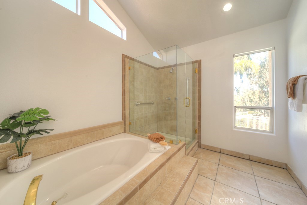 32230 Corte Chatada Temecula, CA 92592 - Photo 39 of 53 a bathroom with a bathtub and shower
