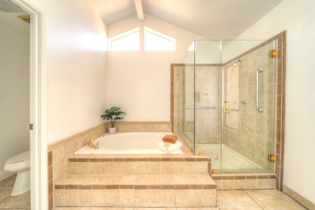 32230 Corte Chatada Temecula, CA 92592 - Photo 40 of 53 a bathroom with a bathtub and shower