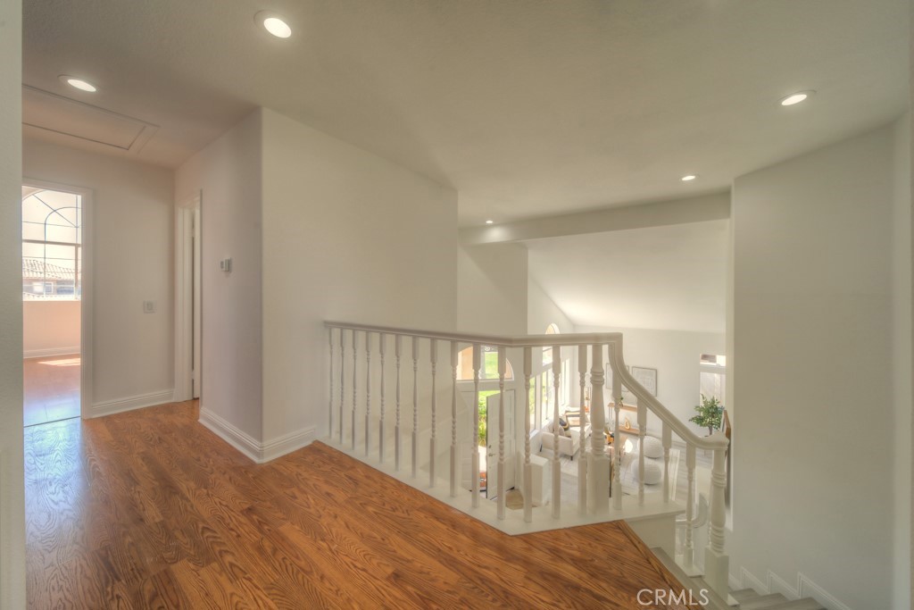 32230 Corte Chatada Temecula, CA 92592 - Photo 41 of 53 a view of an empty room with wooden floor