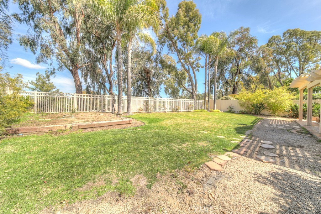 32230 Corte Chatada Temecula, CA 92592 - Photo 48 of 53 a swimming pool with outdoor seating and yard
