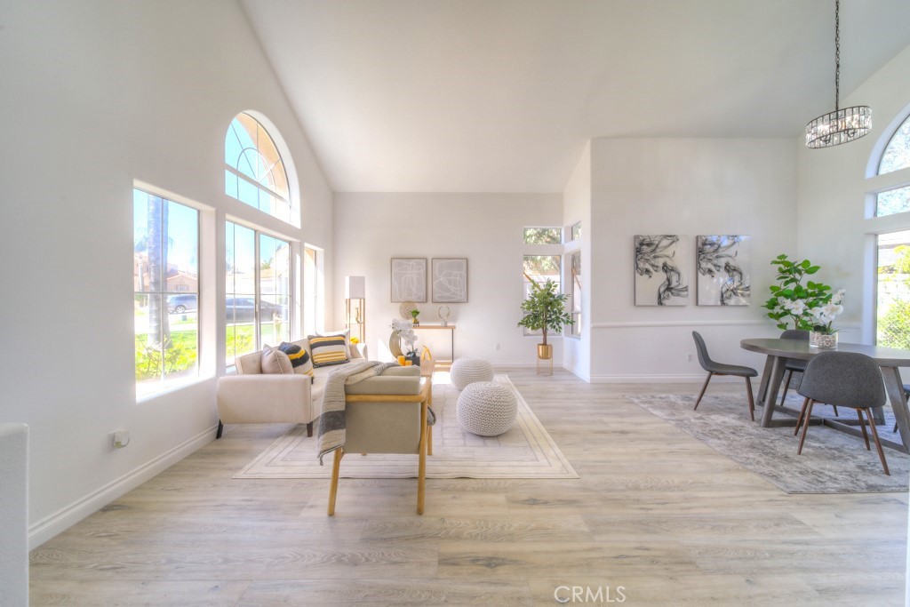 32230 Corte Chatada Temecula, CA 92592 - Photo 7 of 53 a living room with furniture a dining table and a potted plant