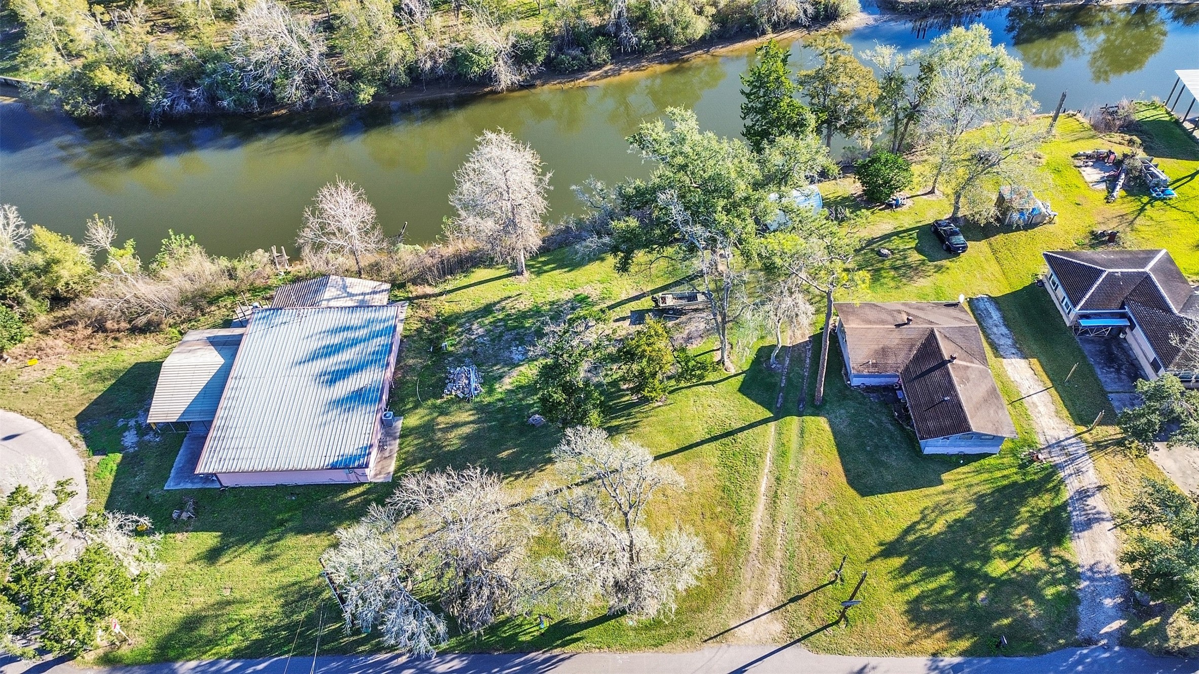 3307 St Anne Liverpool, TX 77577 - Photo 1 of 7 an aerial view of a house with a lake view
