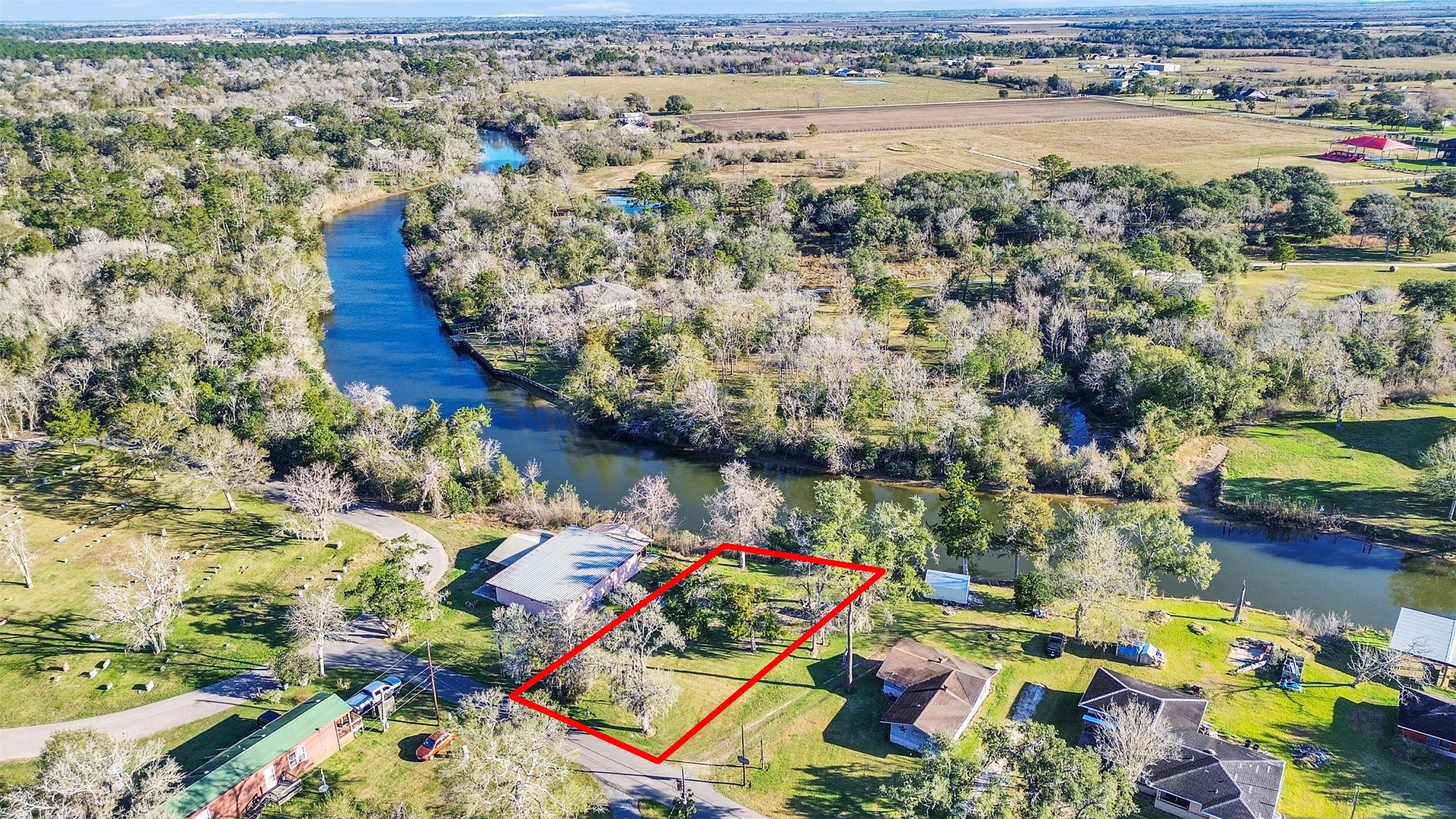 3307 St Anne Liverpool, TX 77577 - Photo 3 of 7 view of lake with yard