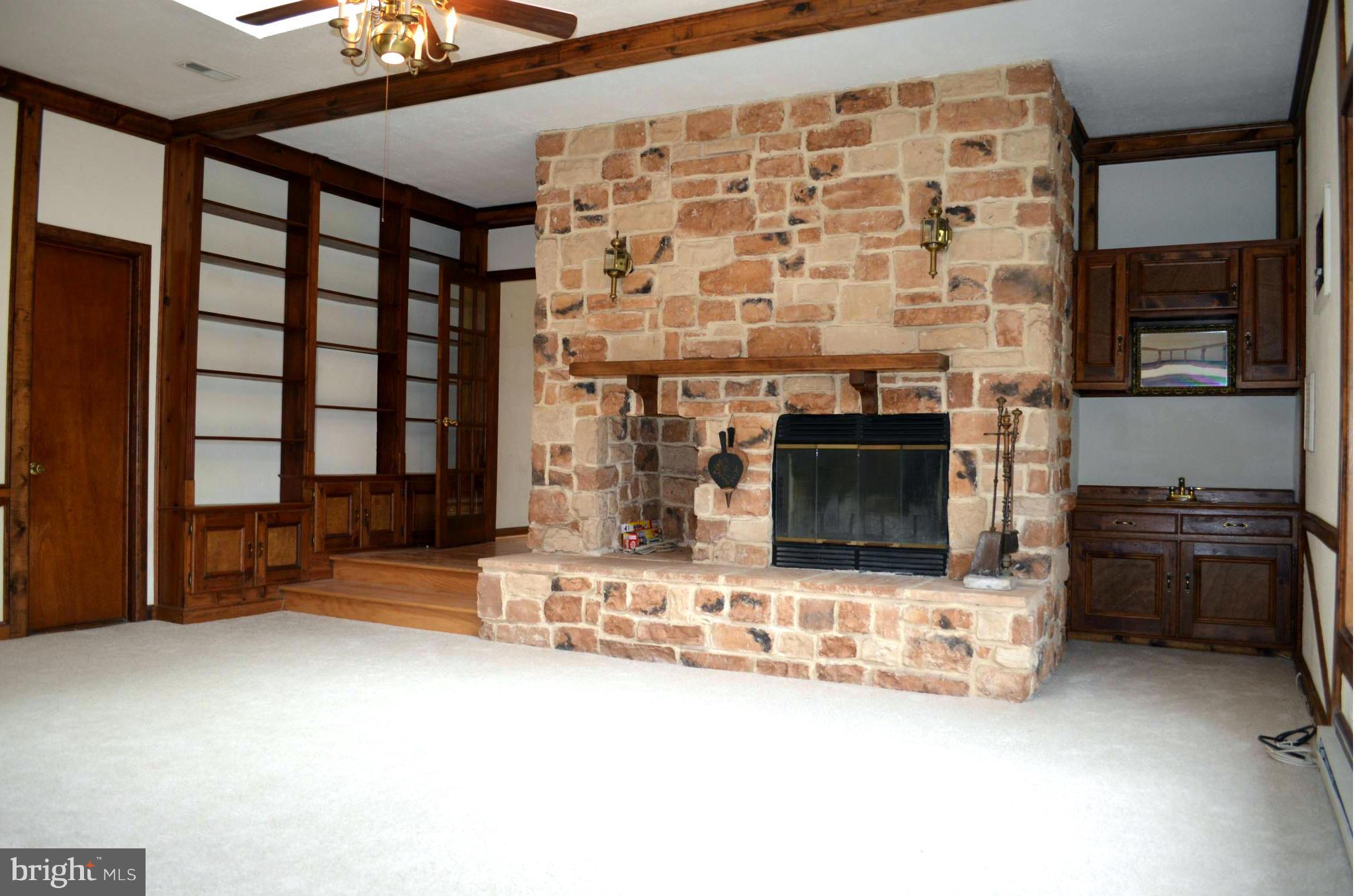 403 East Wheel Road Abingdon, MD 21009 - Photo 12 of 30 Family Room with large stone fireplace and wetbar