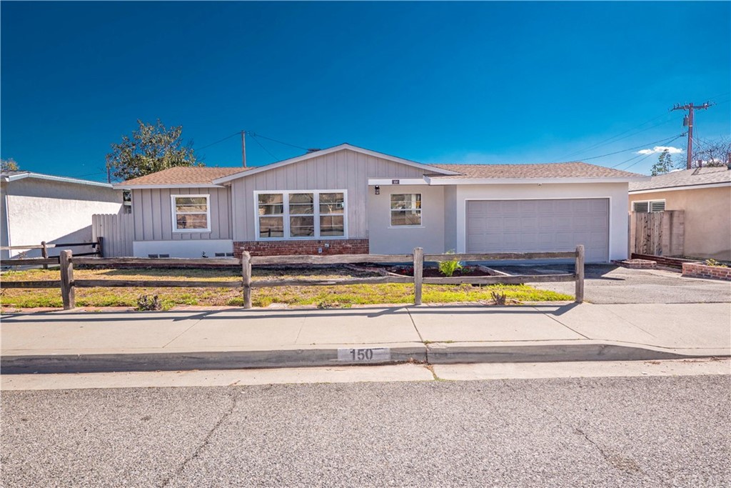 a view of a house with a big yard
