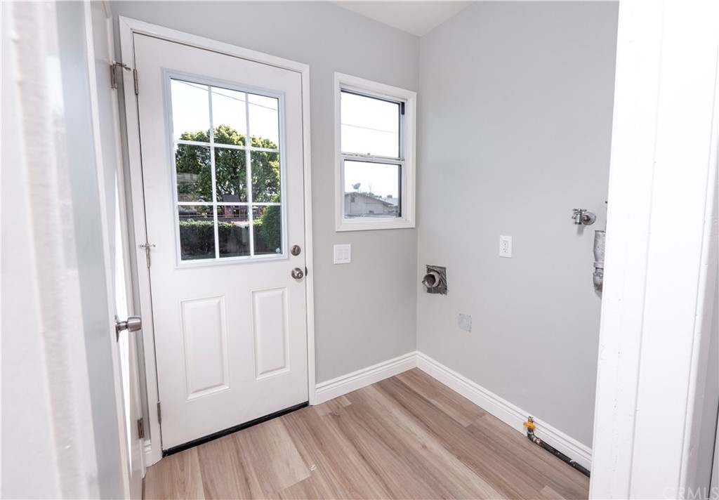 150 East Gladstone Street San Dimas, CA 91773 - Photo 16 of 37 a view of empty room with wooden floor and fan