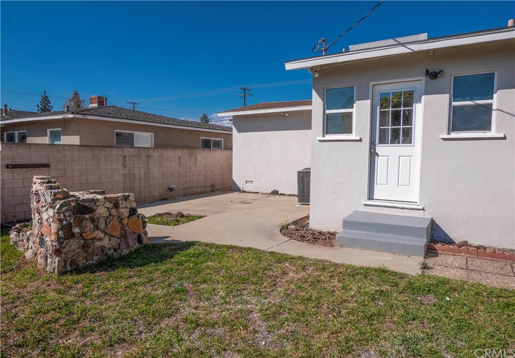 150 East Gladstone Street San Dimas, CA 91773 - Photo 29 of 37 a front view of a house with garden