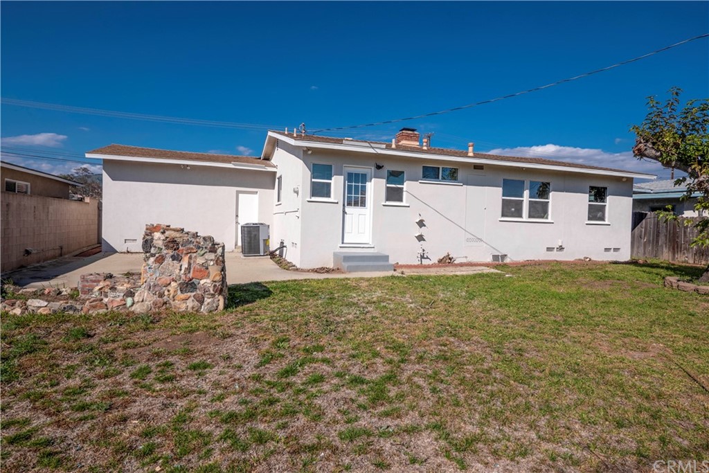 150 East Gladstone Street San Dimas, CA 91773 - Photo 30 of 37 a view of a house with backyard