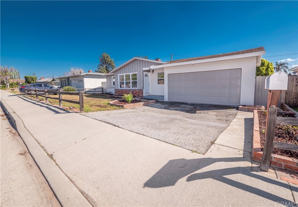 150 East Gladstone Street San Dimas, CA 91773 - Photo 3 of 37 a view of a house with backyard and sitting area