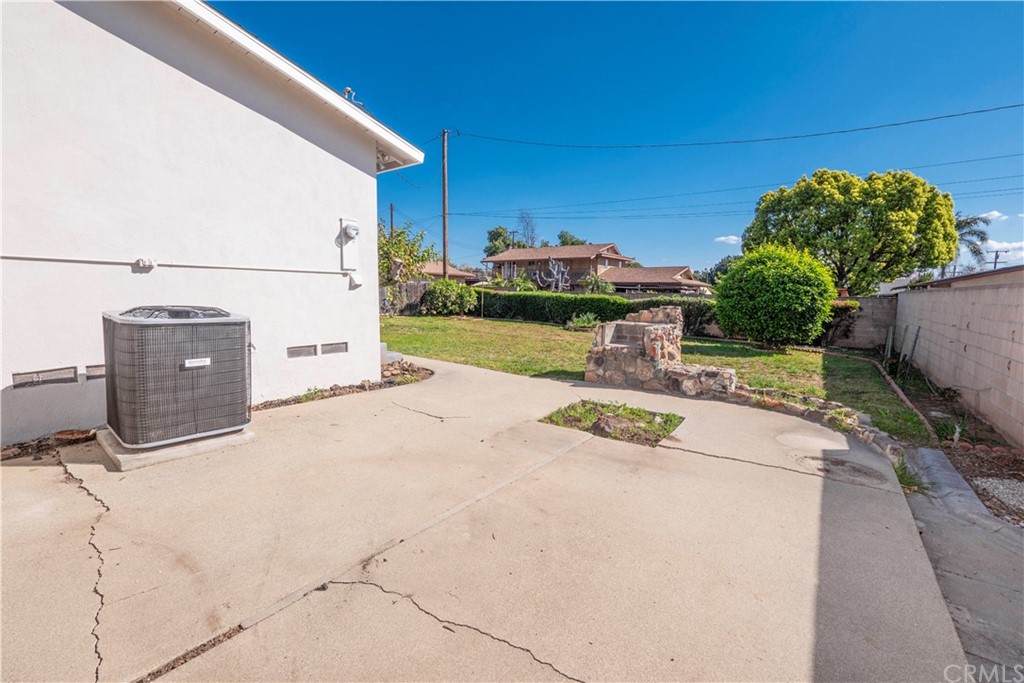 150 East Gladstone Street San Dimas, CA 91773 - Photo 32 of 37 a view of a house with backyard porch and outdoor seating