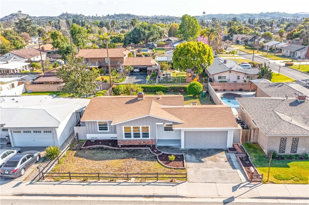 150 East Gladstone Street San Dimas, CA 91773 - Photo 7 of 37 aerial view of a house with a swimming pool