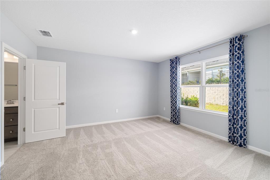 1183 Turtle Is Road Lady Lake, FL 32159 - Photo 19 of 39 a view of an empty room with a window