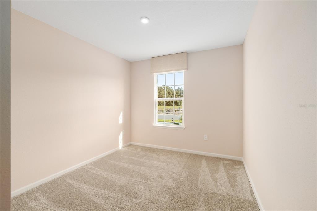 1183 Turtle Is Road Lady Lake, FL 32159 - Photo 24 of 39 an empty room with a window