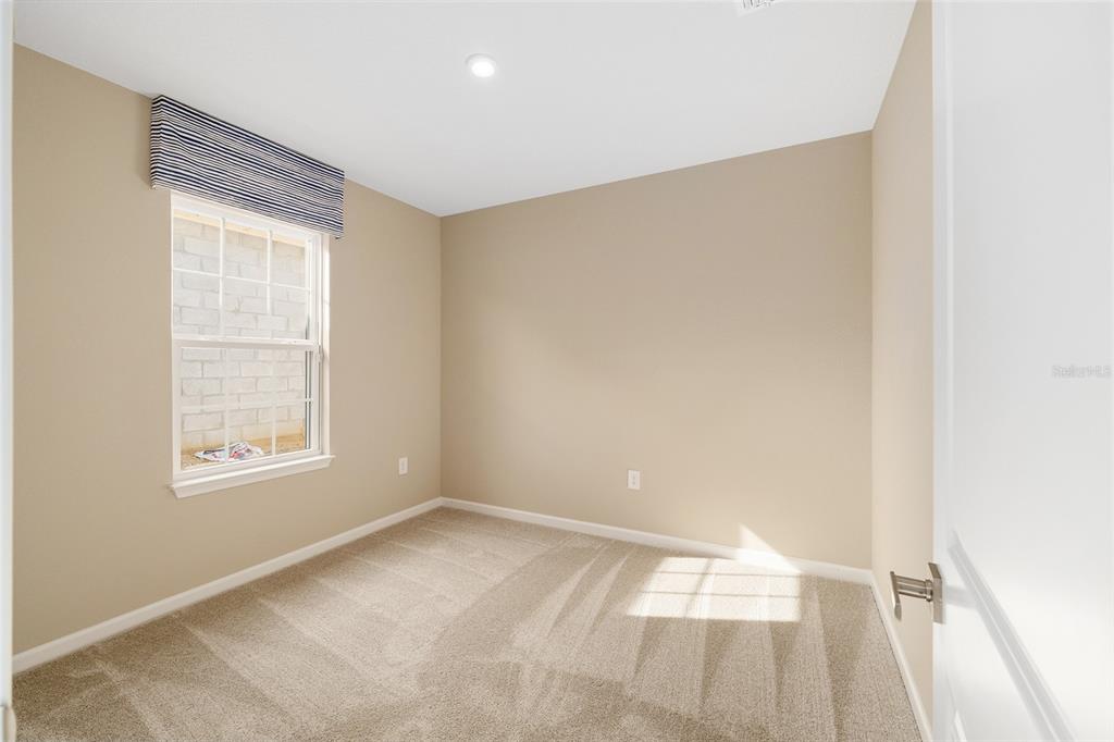 1183 Turtle Is Road Lady Lake, FL 32159 - Photo 29 of 39 a view of an empty room with a window