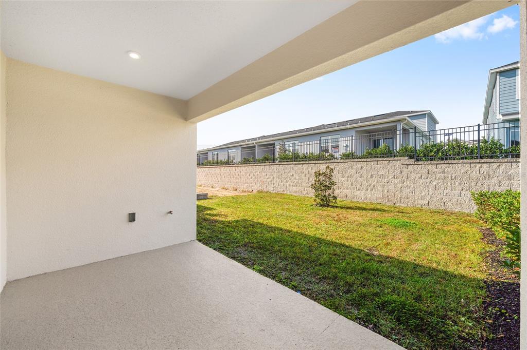 1183 Turtle Is Road Lady Lake, FL 32159 - Photo 37 of 39 a view of a large building with an outdoor space