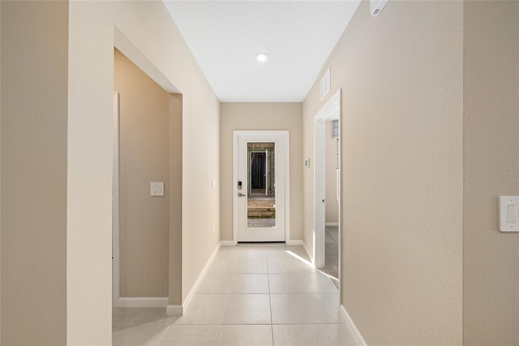 1183 Turtle Is Road Lady Lake, FL 32159 - Photo 8 of 39 a view of a hallway with a dining room
