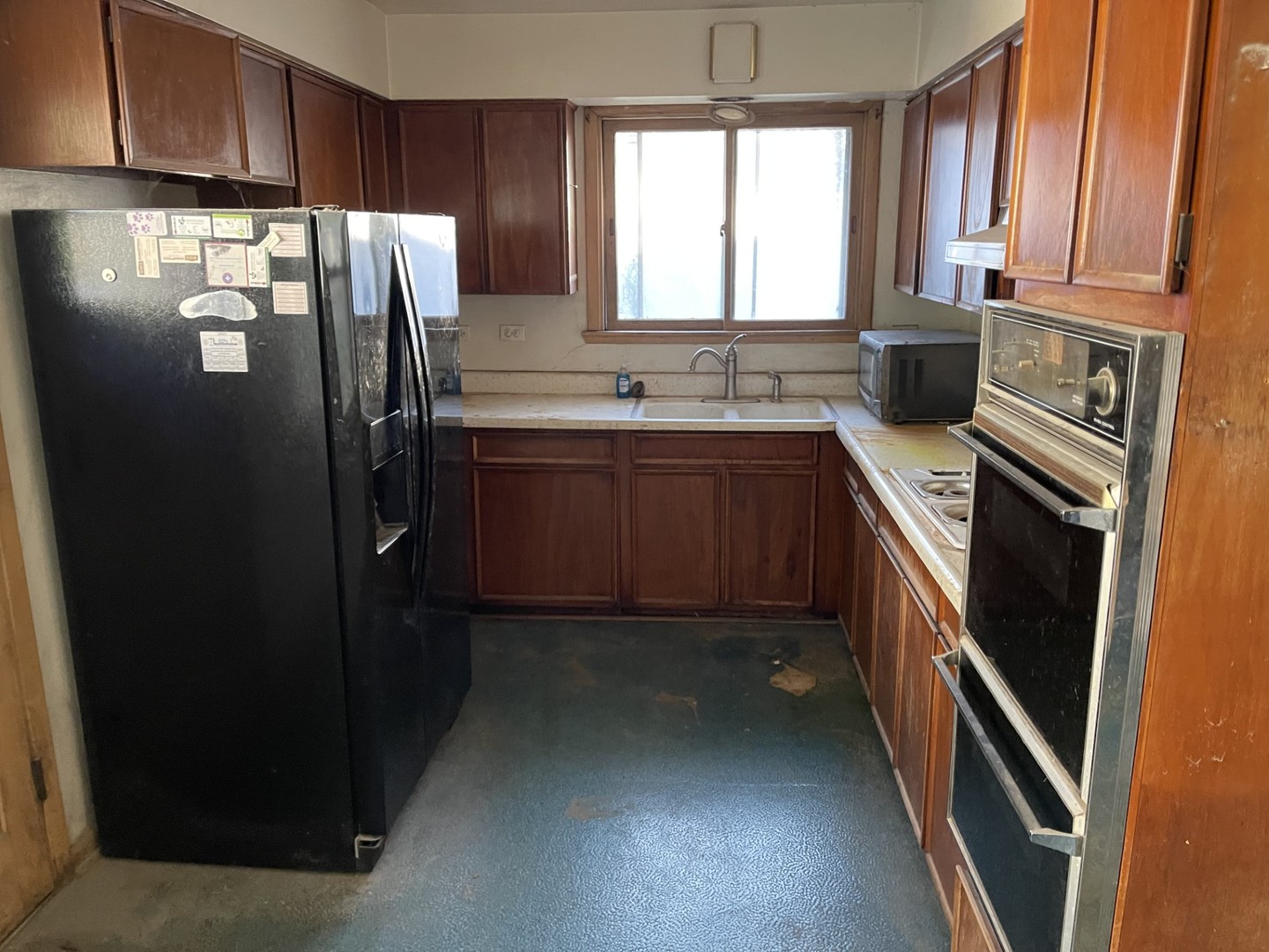 441 East Adams Street Elmhurst, IL 60126 - Photo 10 of 20 a kitchen with stainless steel appliances granite countertop a refrigerator a sink a stove and a refrigerator