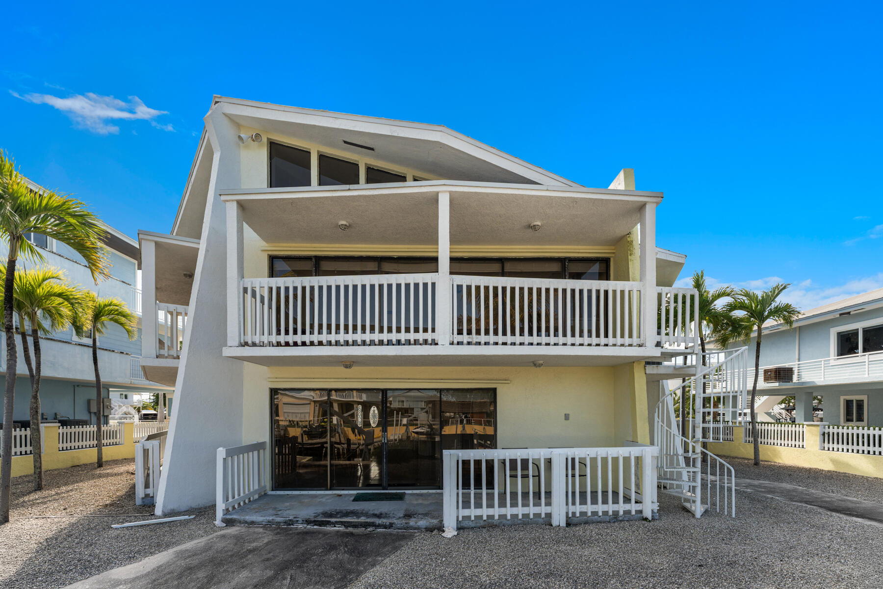 184 Bahama Avenue Key Largo, FL 33037 - Photo 48 of 72 a front view of a house with a yard